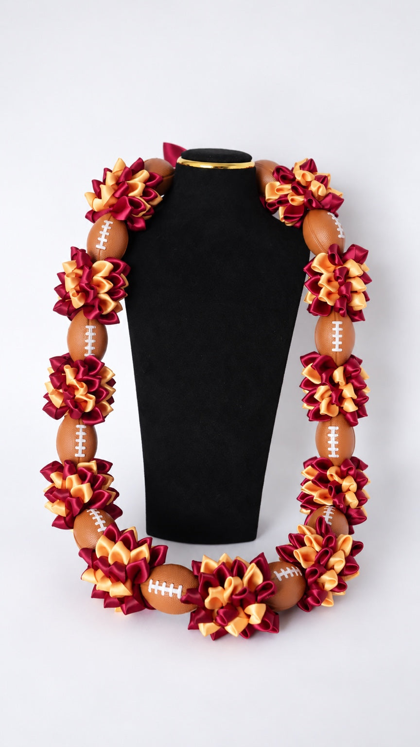 Burgundy and gold satin ribbon graduation lei with footballs